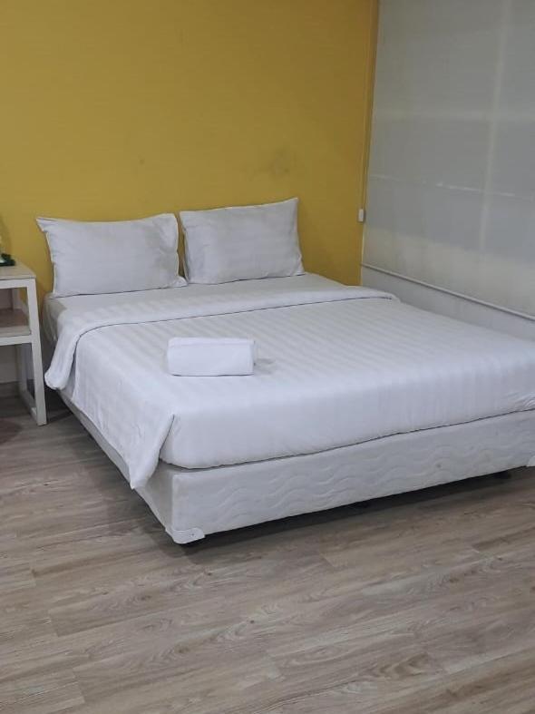 Catania Inn Palembang Buitenkant foto