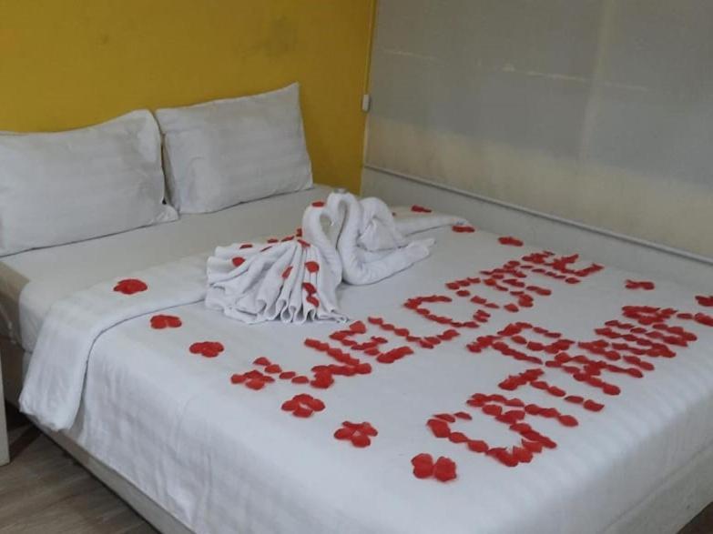 Catania Inn Palembang Buitenkant foto