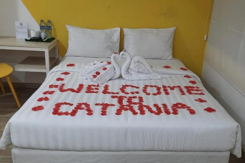 Catania Inn Palembang Buitenkant foto
