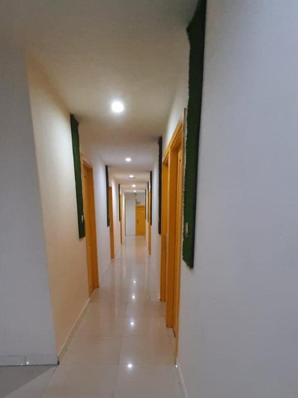 Catania Inn Palembang Buitenkant foto